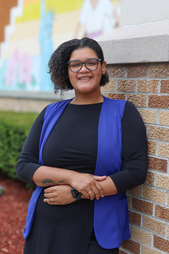 Human Resources Director Genesis Vazquez outside smiling